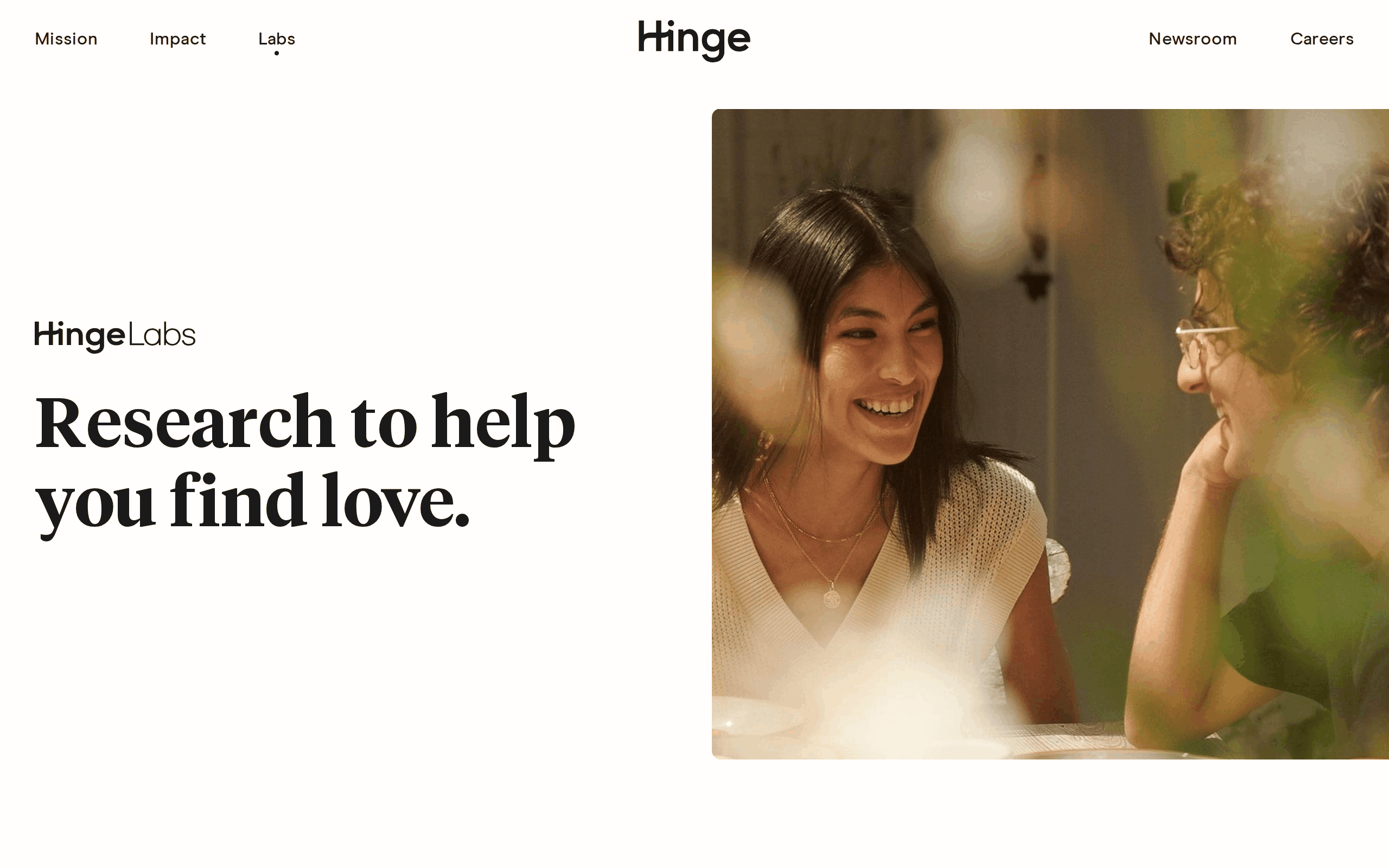 Hinge Labs page with the headline Research to help you find love next to a photo of two people on a date